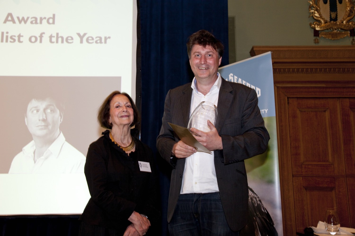 Lucas Hollweg receiving the Evelyn Rose Award for Cookery Journalist of the Year from Claudia Roden